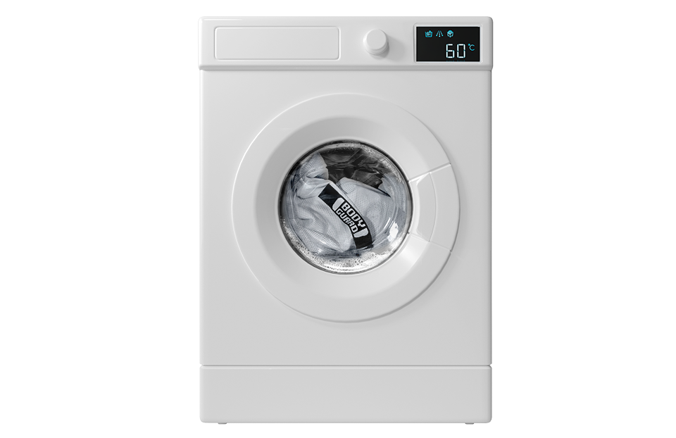 Wasmachine met een matrashoes erin