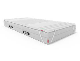 De topper ligt op het BODYGUARD® matras en is met de bevestigingslussen eraan vastgemaakt.